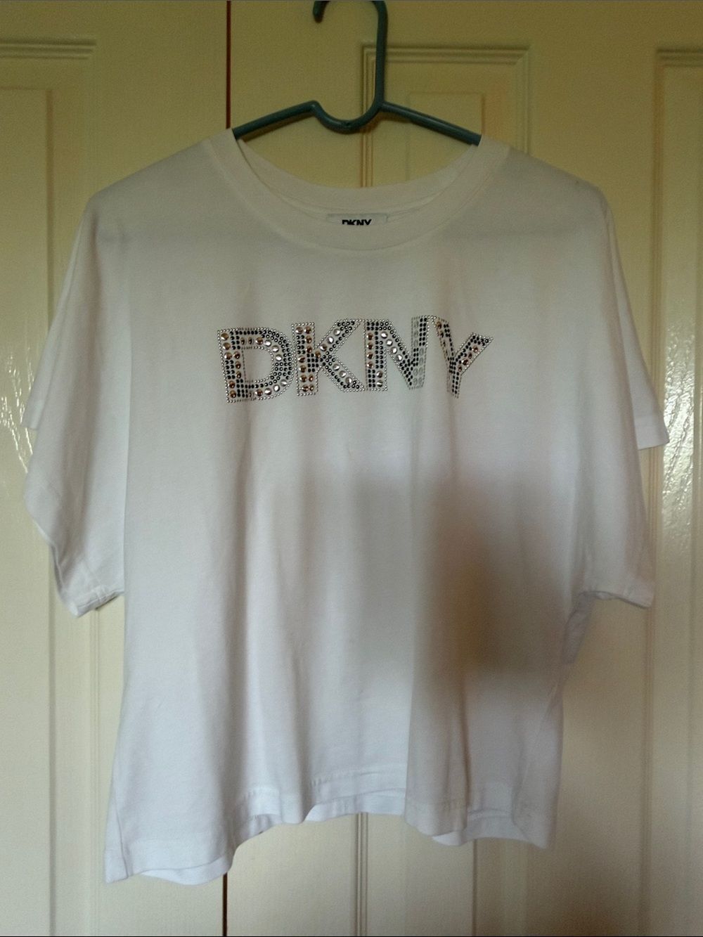 DKNY White Tee with Sparkling Logo Embellishment